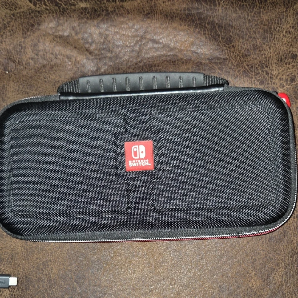 Nintendo Switch Console with Purple and Orange Joy-Con